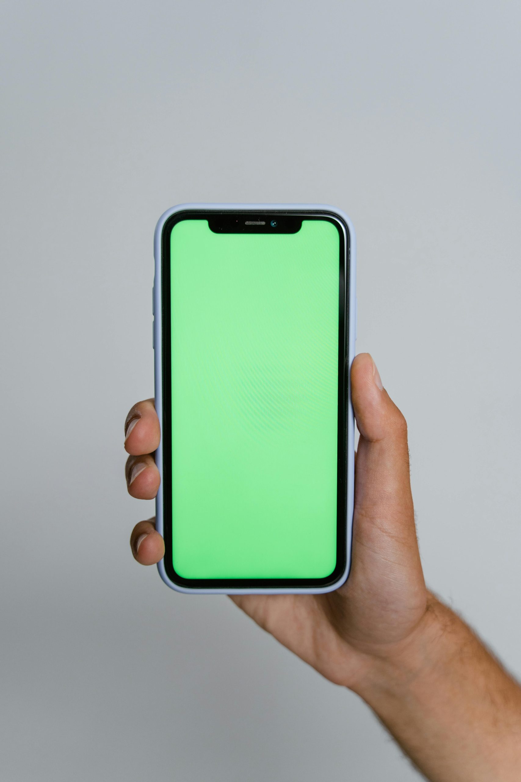 Free Person Holding Black Iphone 5 Stock Photo